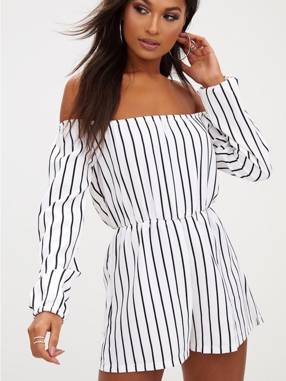 white and black striped long sleeve off the shoulder romper